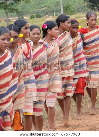 ORISSA,  INDIA - NOV 12 -Tribal women link arms for Gdaba harvest dance on Nov 12, 2009, in Lamptaput, Orissa, India