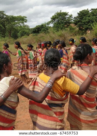 ORISSA,  INDIA - NOV 12 -Tribal women link arms for Gdaba harvest dance on Nov 12, 2009, in Lamptaput, Orissa, India
