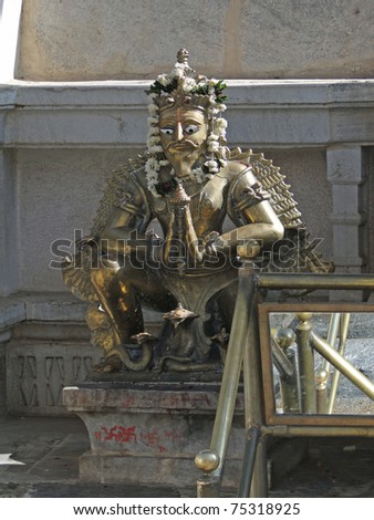Metal statue of Hindu god,  in temple in  Udaipur, India