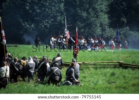 SEATTLE - JUL 10 - Union artillery fires their gun in a Civil War battle reenactment on July 10, 1996 near Seattle.