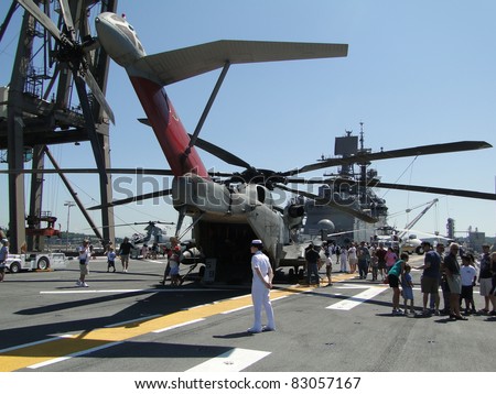 SEATTLE - AUG 4 : Civilians inspect an CH-53E Sea Stallion helicopter,during a tour of the Amphibious Assault Ship Bonhomme Richard, LDH-6,  on Aug 4, 2011, in Seattle.