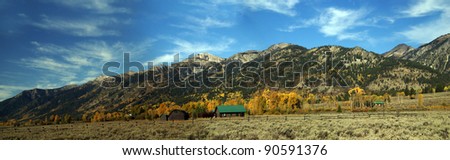 Panorama, Western buildings with mountains in background, 	 	Grand Teton National Park,	Wyoming