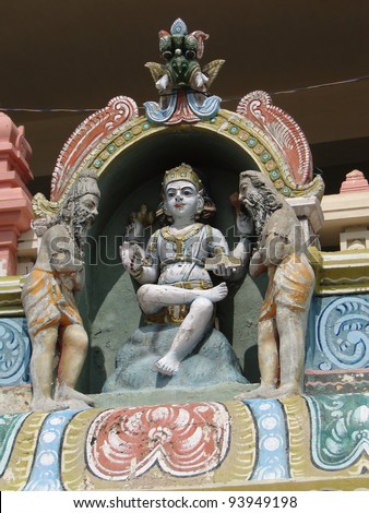 Colorful sculptures of gods & goddesses  on temple exterior  in   Kanchipuram, India