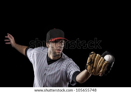 Baseball Player catching a ball