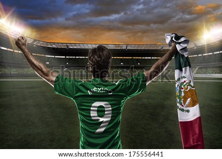 Mexican soccer player, celebrating with the fans.