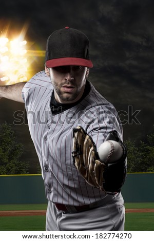 Baseball Player on a baseball Stadium.
