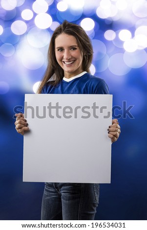 Female Italian Fan holding a blank sign on a blue lights background.