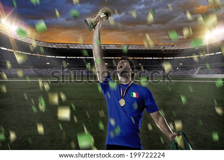 Italian soccer player, celebrating the championship with a trophy in his hand. On a stadium.