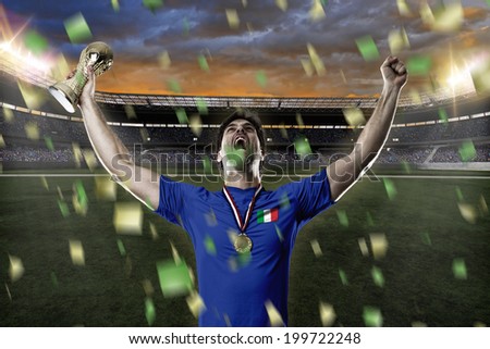 Italian soccer player, celebrating the championship with a trophy in his hand. On a stadium.