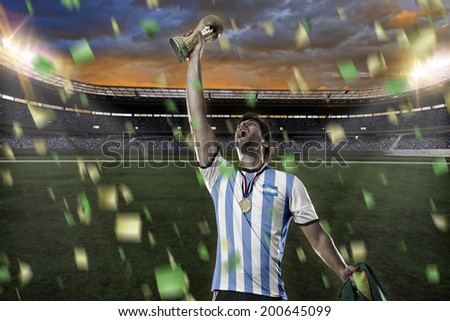 Argentinian soccer player, celebrating the championship with a trophy in his hand. On a stadium.