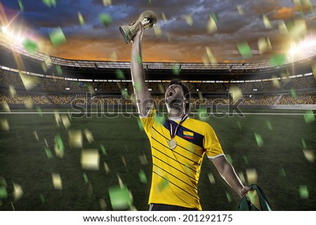 Colombian soccer player, celebrating the championship with a trophy in his hand. On a stadium.