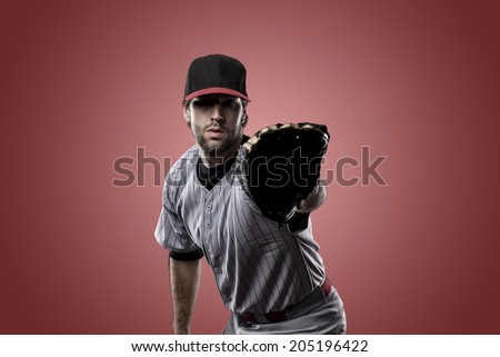 Baseball Player on a Green Uniform on baseball Stadium.