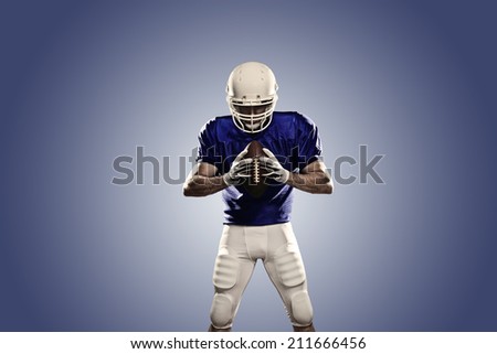 Football Player on a Blue uniform, on a Blue background.