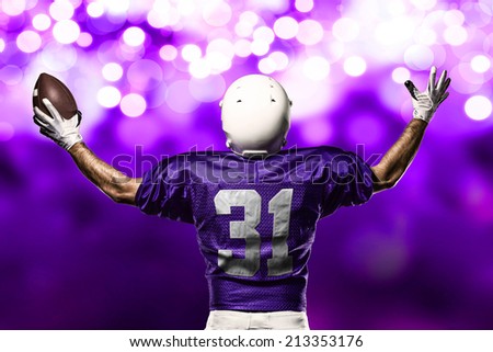 Football Player on a purple uniform celebrating on a purple lights background.