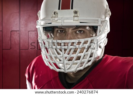 Close up in the eyes of a Football Player with a red uniform on a locker room.