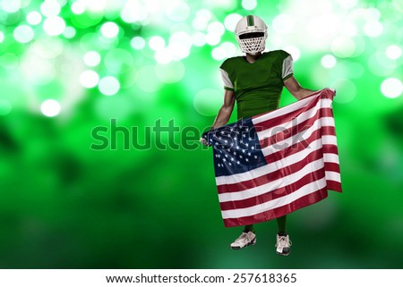 Football Player with a green uniform and a american flag, on a green lights background.