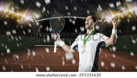 Tennis player celebrating with a gold medal, on a clay tennis court.