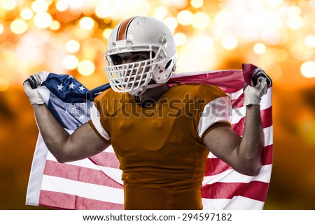 Football Player with a orange uniform and a american flag, on a orange lights background.