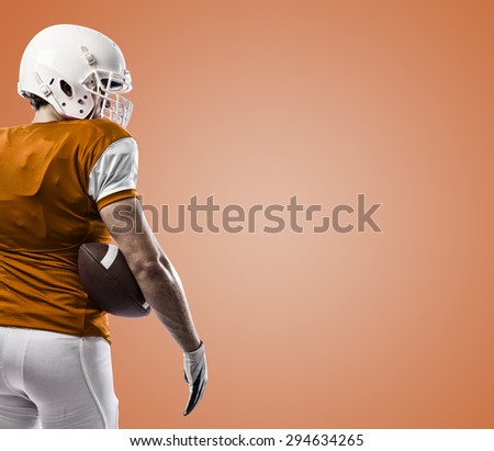 Football Player with a orange uniform on a orange background.
