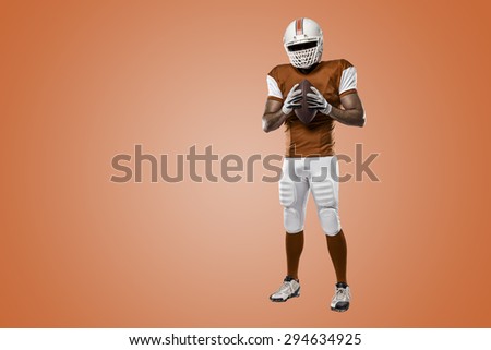 Football Player with a orange uniform on a orange background.
