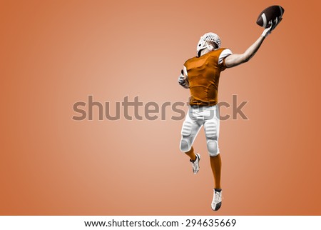 Football Player with a orange uniform making a catch on a orange background.