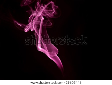 A trail of smoke on a black background