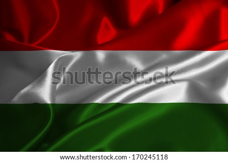 Hungary flag on satin texture.