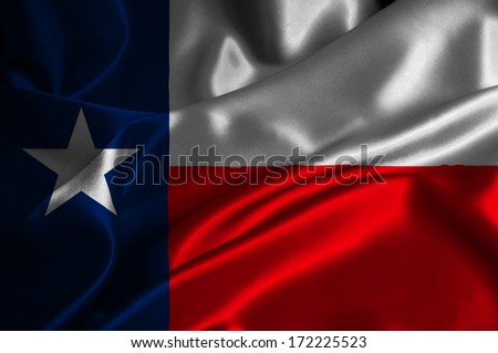 Texas flag on satin texture.