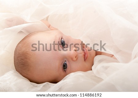 beautiful baby face with soft cover