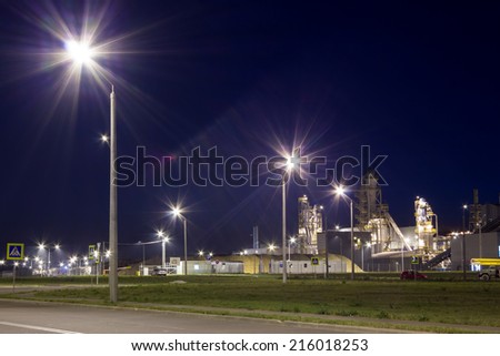 Night image of timber processing plant. Modern factory.
