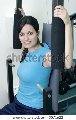 young woman goes in for sport in the gym