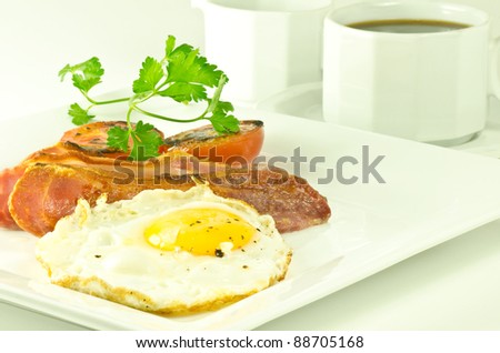 cooked breakfast with coffee isolated on white