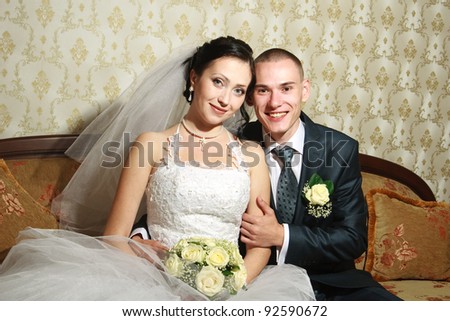 portrait of a young couple married in the wedding room