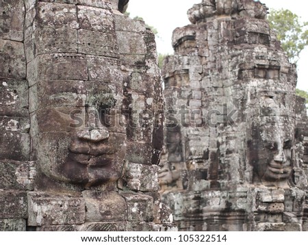 SIEM REAP - MAY 26: The Bayon facade on May 26, 2012 in Siem Reap, Cambodia. The Bayon is a well-known and richly decorated Khmer temple at Angkor in Cambodia.