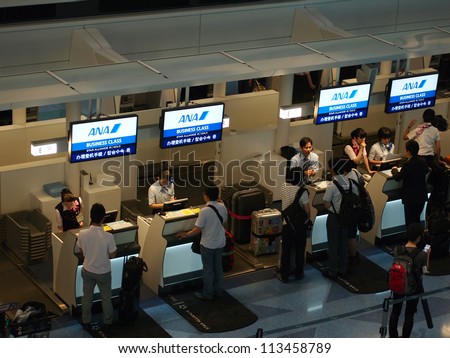 TOKYO - AUGUST 2: All Nippon Airways (ANA) check in counter on August 2, 2012 at Tokyo International Airport, Tokyo. ANA is Japan\'s largest airline.