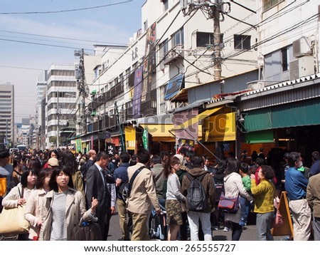 TOKYO, JAPAN - MAR 28: Tsukiji Outer Market in Tokyo, Japan on March 28, 2015.  Tsukiji Outer Market is a part of Tsukiji Market which is the biggest wholesale fish market in the world.