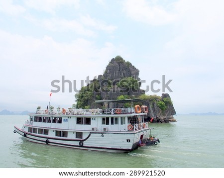 HA LONG BAY, VIETNAM - MAY 24: A cruise boat at Ha Long Bay, Vietnam on May 24, 2015. Ha Long Bay is a UNESCO World Heritage Site, and a popular travel destination, in Vietnam.