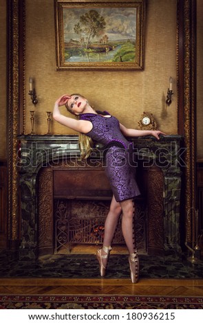 fashionable vintage woman dancing ballet in an old house