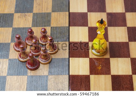 Luxurious chess king opposing shabby pawns in concept of social inequality.