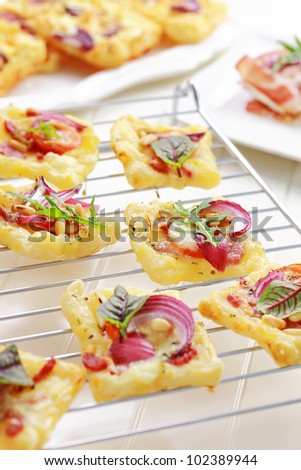 Puff pastry with cheese, tomato and vegetables