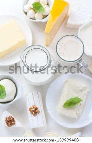 Assortment of different dairy products on white background