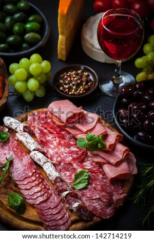 Meat Catering Platter With Olives And Red Wine