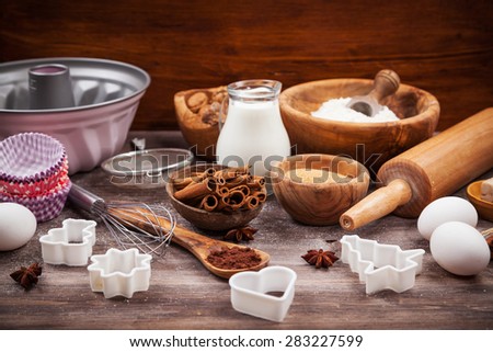 Baking utensils with ingredients for cake or cookies