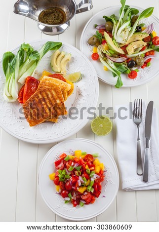 Low calorie salsa salad with grilled cheese halloumi and mixed salad