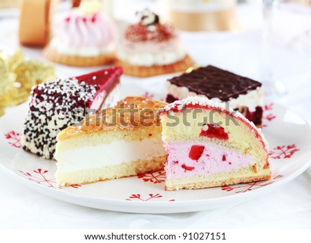 Assorted whipped cream cakes and other desserts