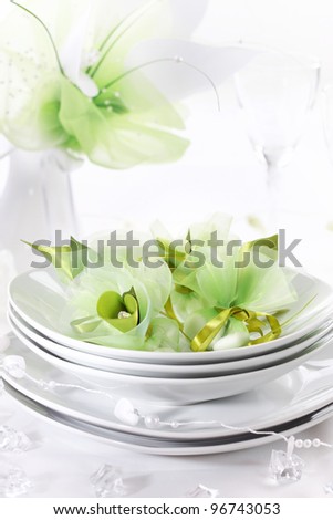 stock photo Luxury place setting for wedding in white and green tone