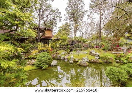 The Japanese Tea Garden in Golden Gate Park in San Francisco, California, United States of America. A view of the native Japanese and Chinese plants,red pagodas and pond that create a relaxing scenery