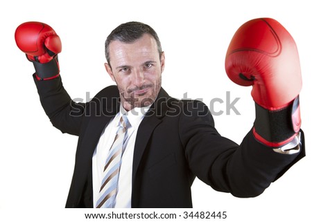 He wears boxing gloves .