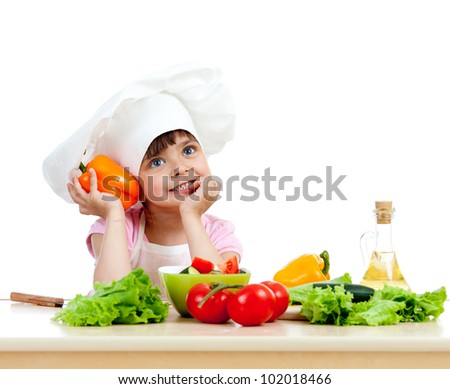 Chef girl preparing healthy food vegetable salad over white background