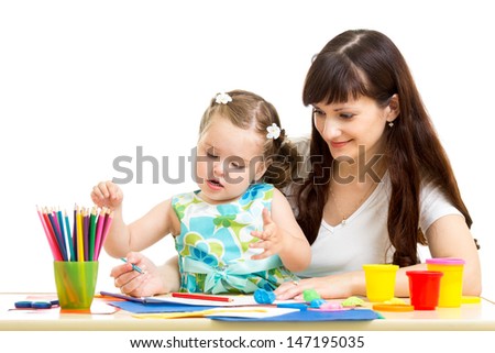 Mother and kid girl draw together Mother and kid girl draw together